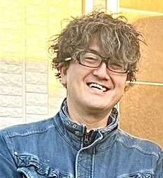 江口　和幸の近影写真。